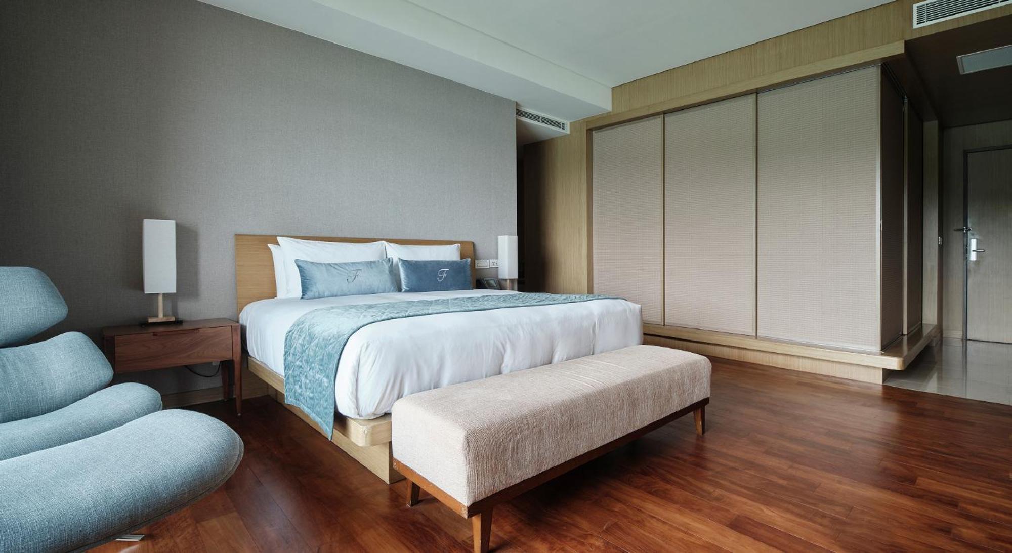Fleur De Chine Hotel Yuchi Pokoj fotografie A bedroom at the hotel